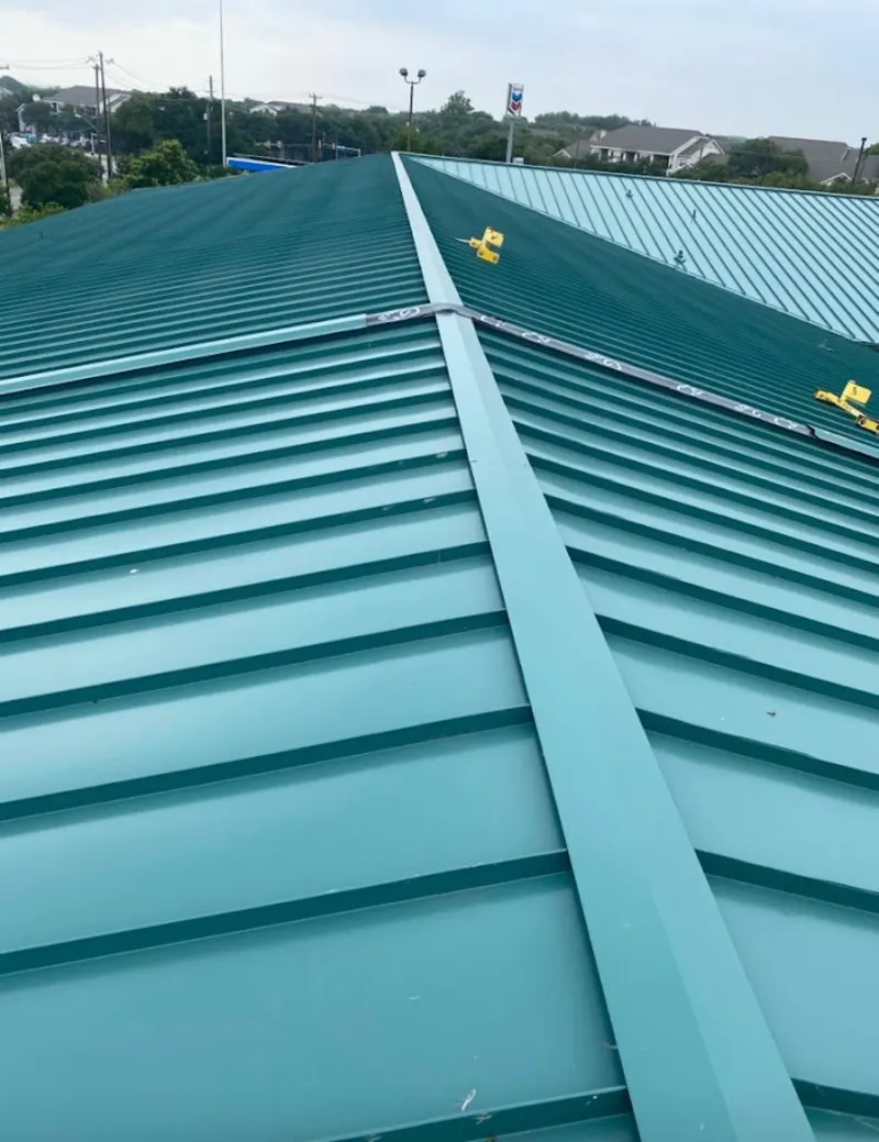 Green commercial metal roof ridge and valley for Metal Roof Repair in Lovington